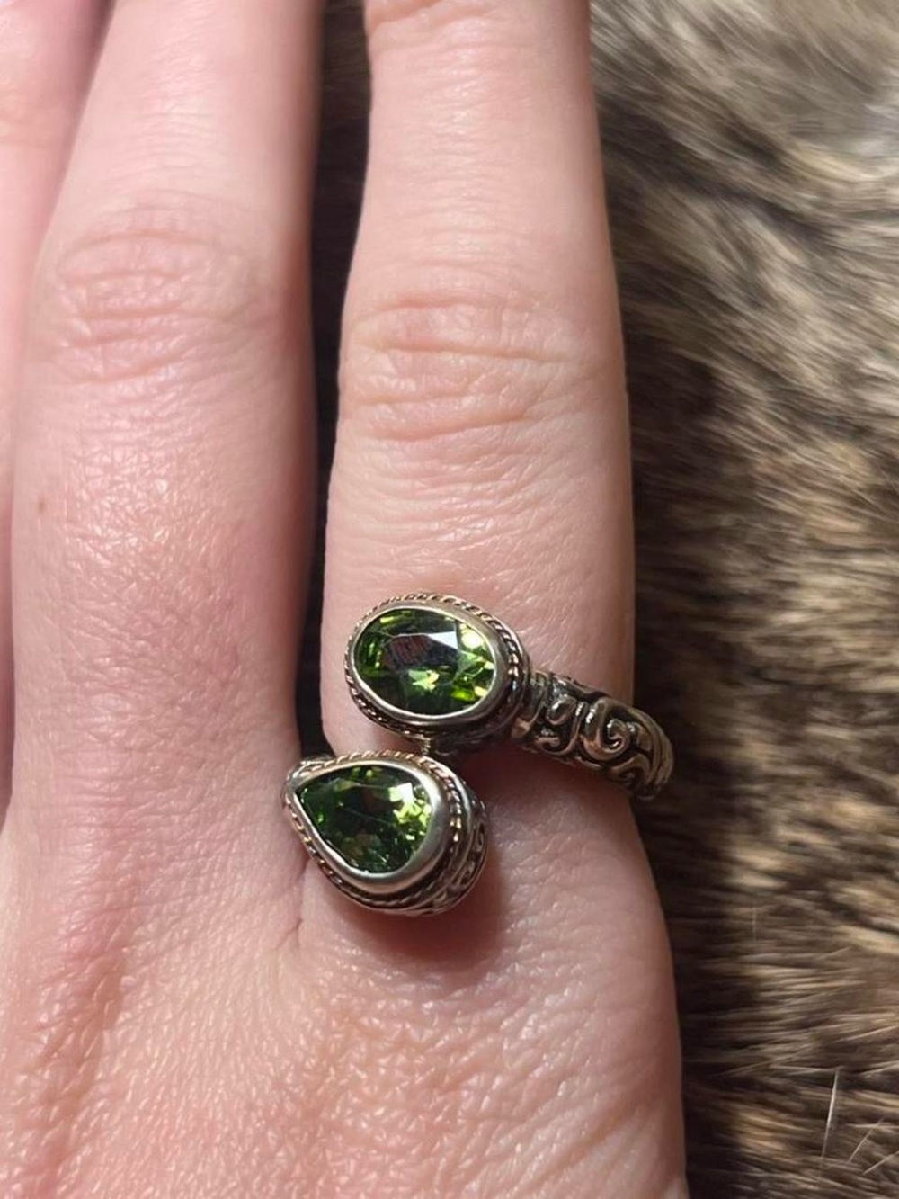 Sterling silver and 18k yellow gold Samuel Benham closed bypass peridot ring